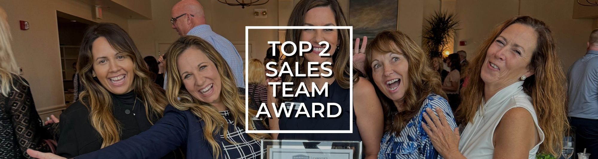 WP photo of the No. 2 Sales Team Award received by Top Agent Team Florida