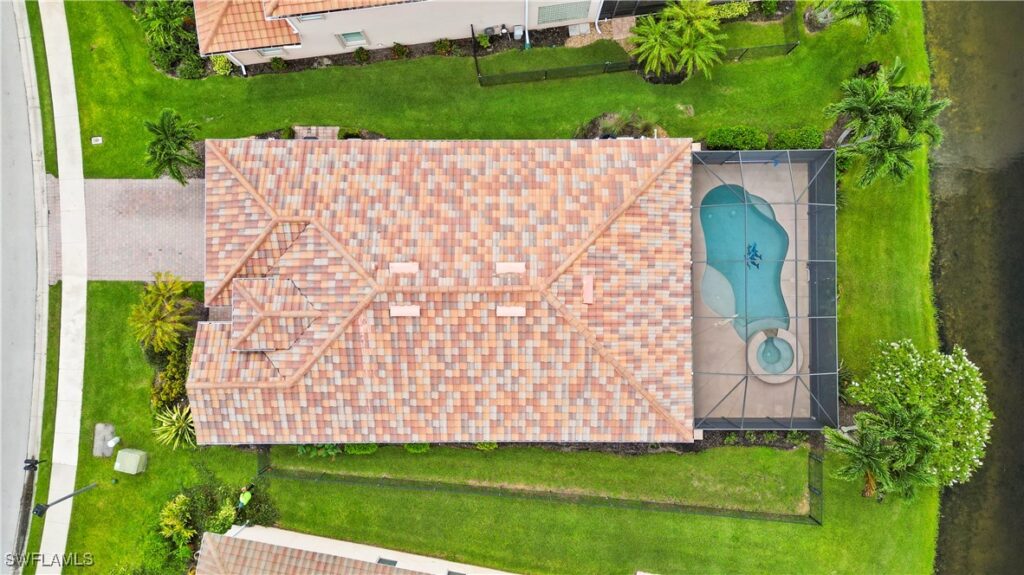 Aerial photo of the lakefront pool home in Malagrotta Circle.