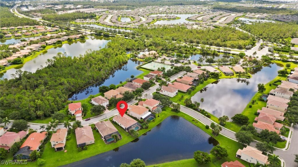 Aerial photo of the lakefront pool home in Malagrotta Circle.