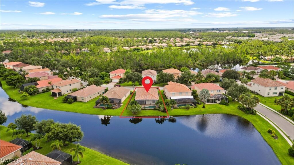 Aerial photo of the lakefront pool home in Malagrotta Circle.