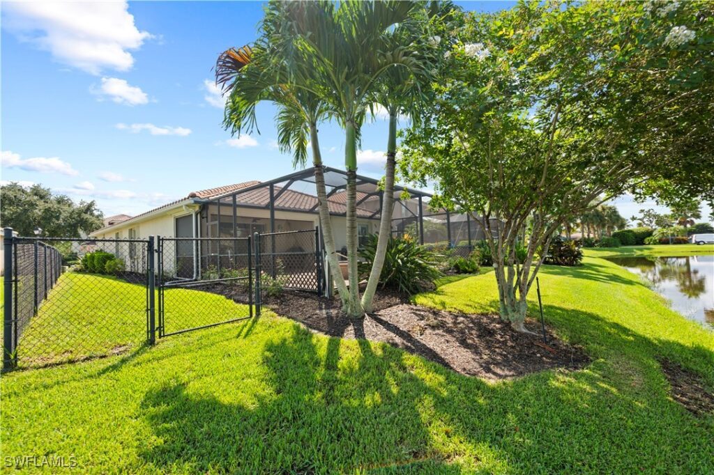 Exterior photo of the lakefront home in Malagrotta Circle in Cape Coral