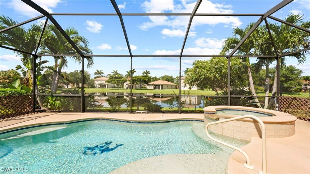 Photo of the lakefront pool and spa perfect for enjoying the beautiful Florida sunsets.